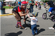 Clown and Child High-Fiving