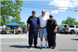 Three Men Smiling for the Camera
