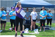 Woman Speaking to Crowd (5)