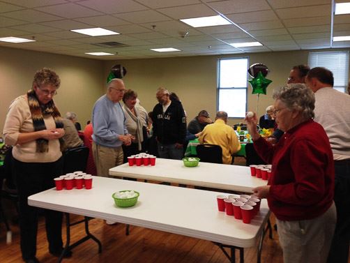 Seniors Playing Cup Pong