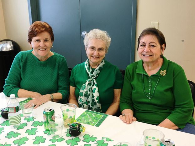 Three Ladies Smiling for the Camera
