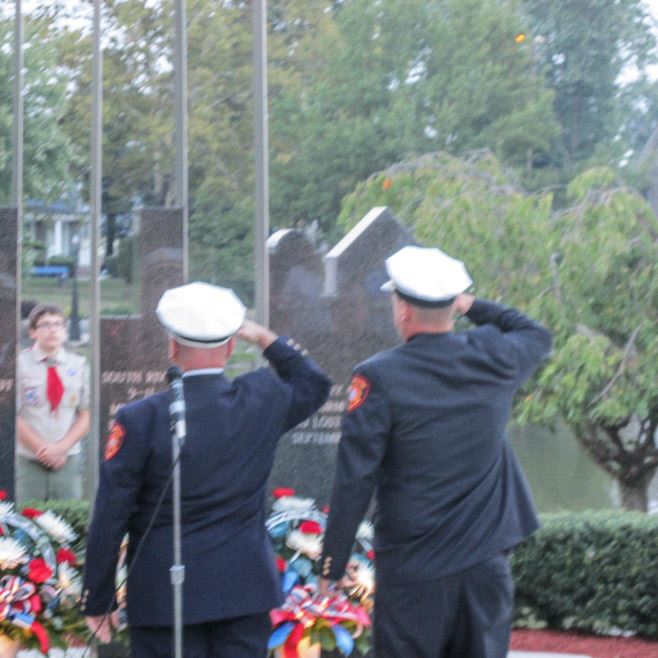 Firefighters Saluting