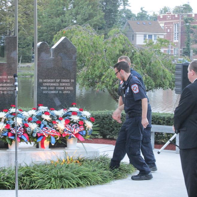 Emergency Medical Technicians Paying Respect