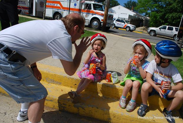 Representative Speaking with Children