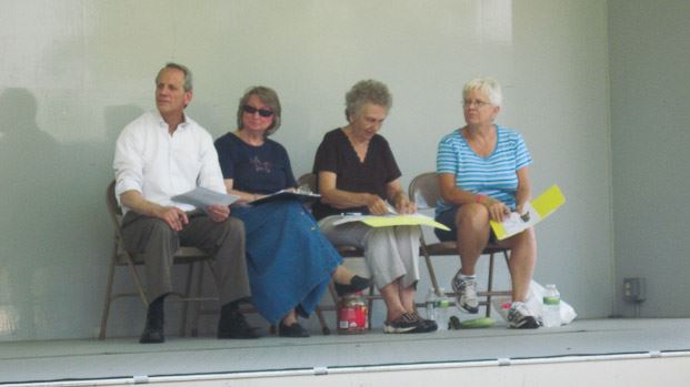 People Sitting on Stage