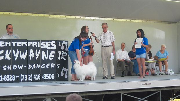 Dog and Family on Stage